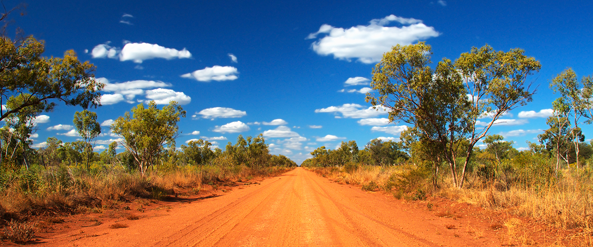 desert road with blue sky